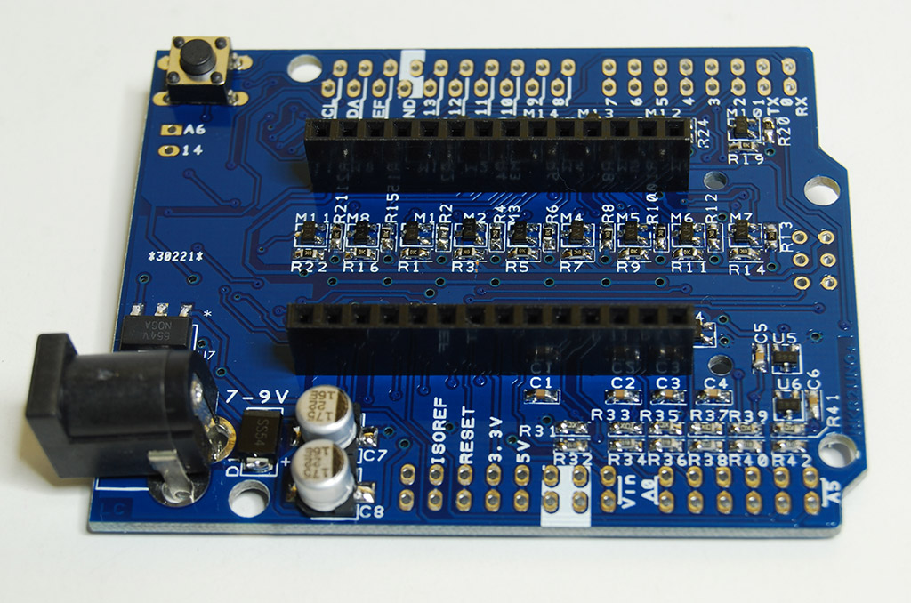 Assembling the reset pushbutton and the 2.5mm DC connector